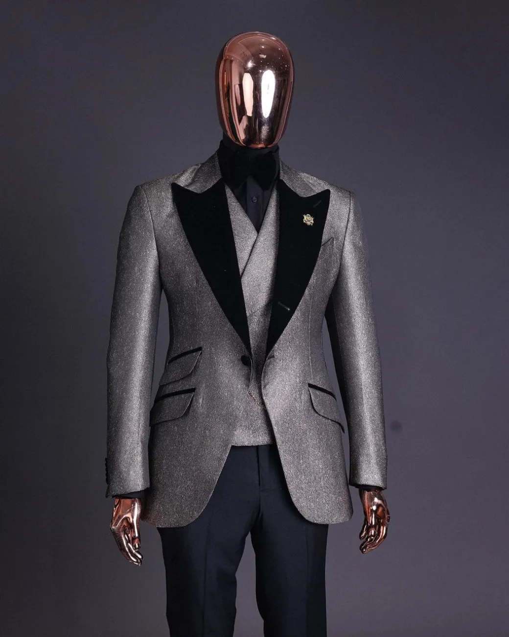 A Gold, black and silver mix metallic jacquard, peak lapel tuxedo suit