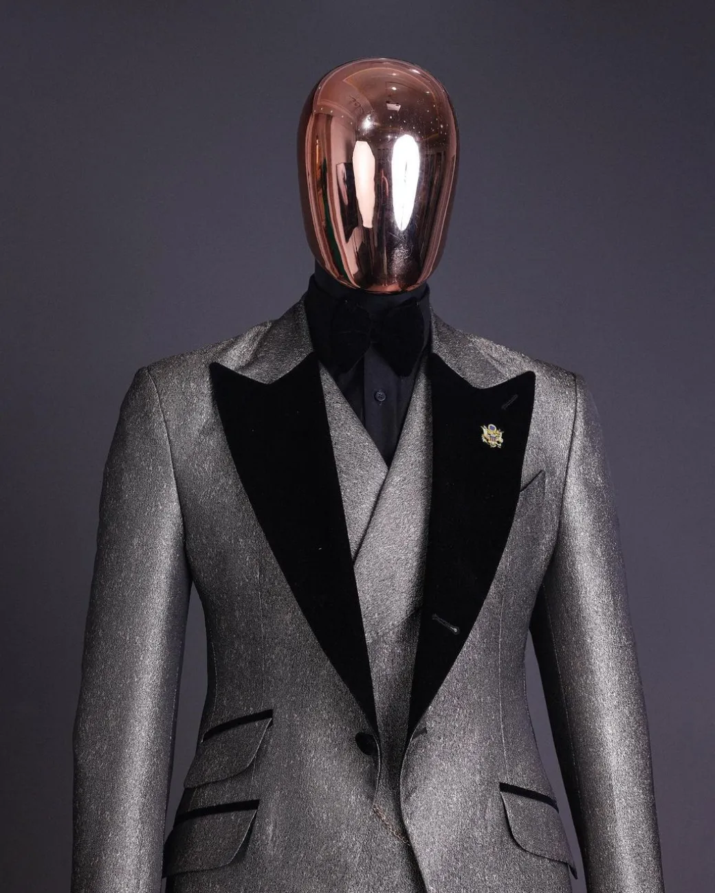 A Gold, black and silver mix metallic jacquard, peak lapel tuxedo suit