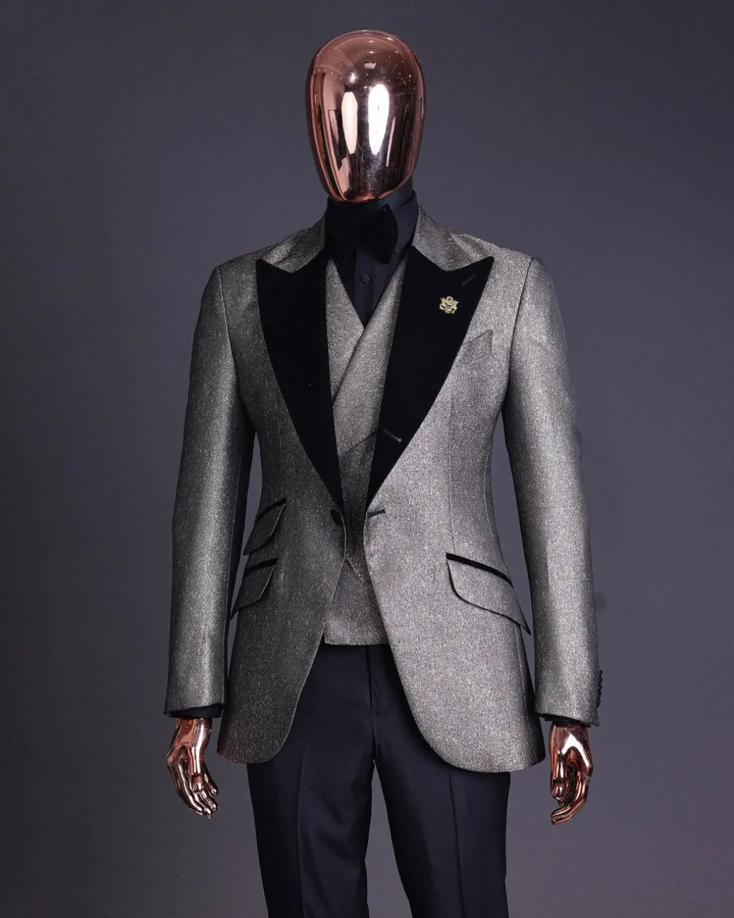 A Gold, black and silver mix metallic jacquard, peak lapel tuxedo suit