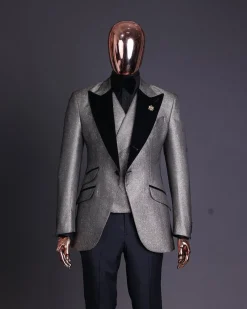 A Gold, black and silver mix metallic jacquard, peak lapel tuxedo suit