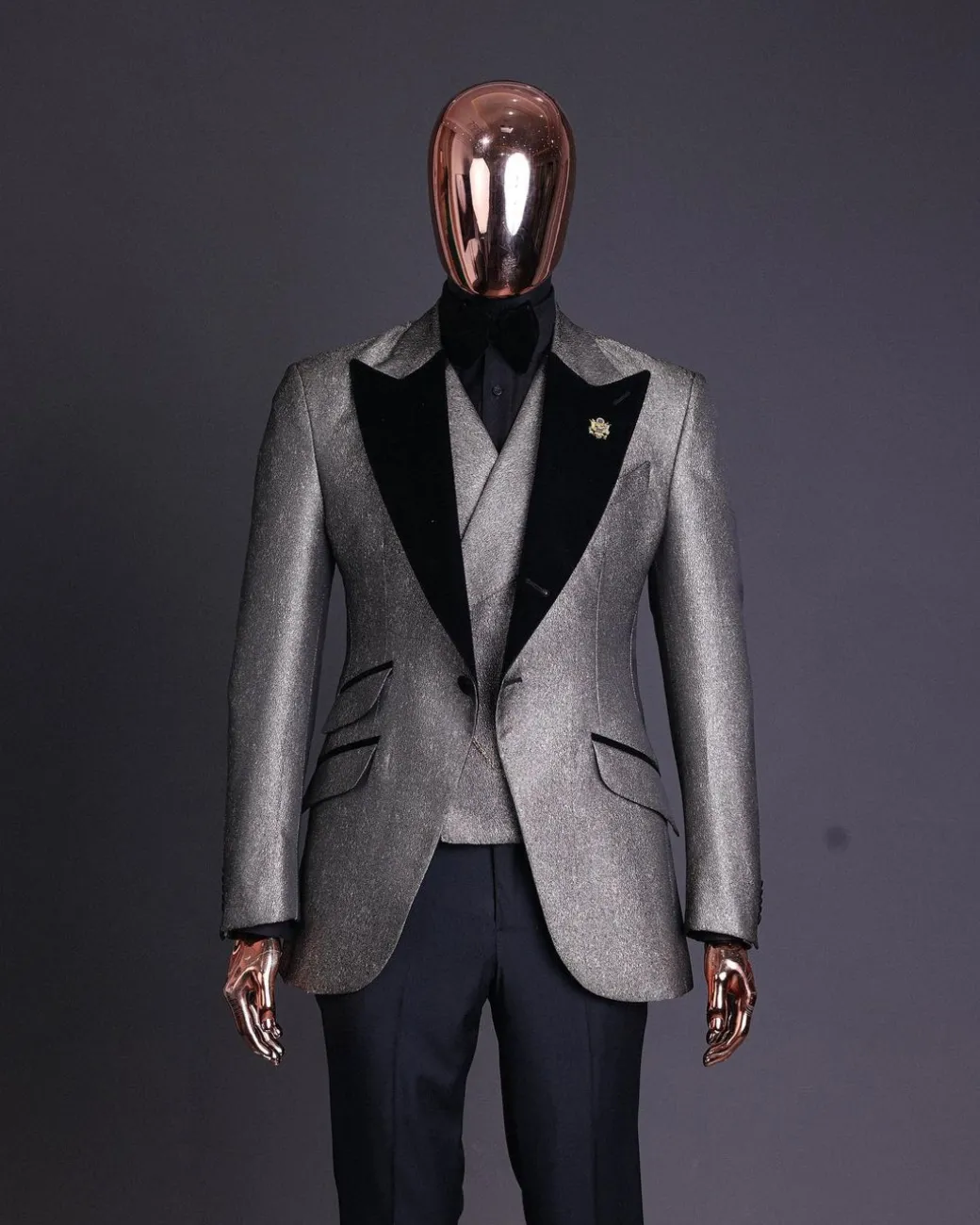 A Gold, black and silver mix metallic jacquard, peak lapel tuxedo suit