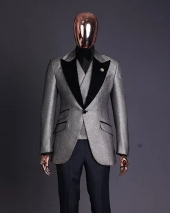 A Gold, black and silver mix metallic jacquard, peak lapel tuxedo suit