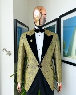 A gold metallic jacquard peak lapel tuxedo suit