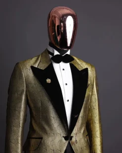 A gold metallic jacquard peak lapel tuxedo suit