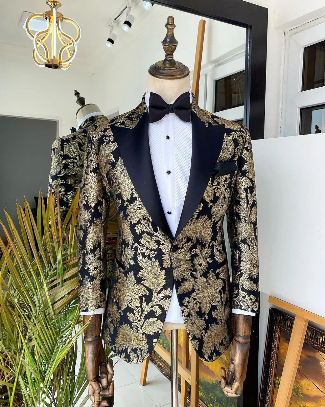 A Gold Patterned Jacquard Peak Label tuxedo suit