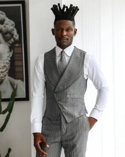 A Grey and ivory white pencil stripe, double-breasted shawl lapel waistcoat.