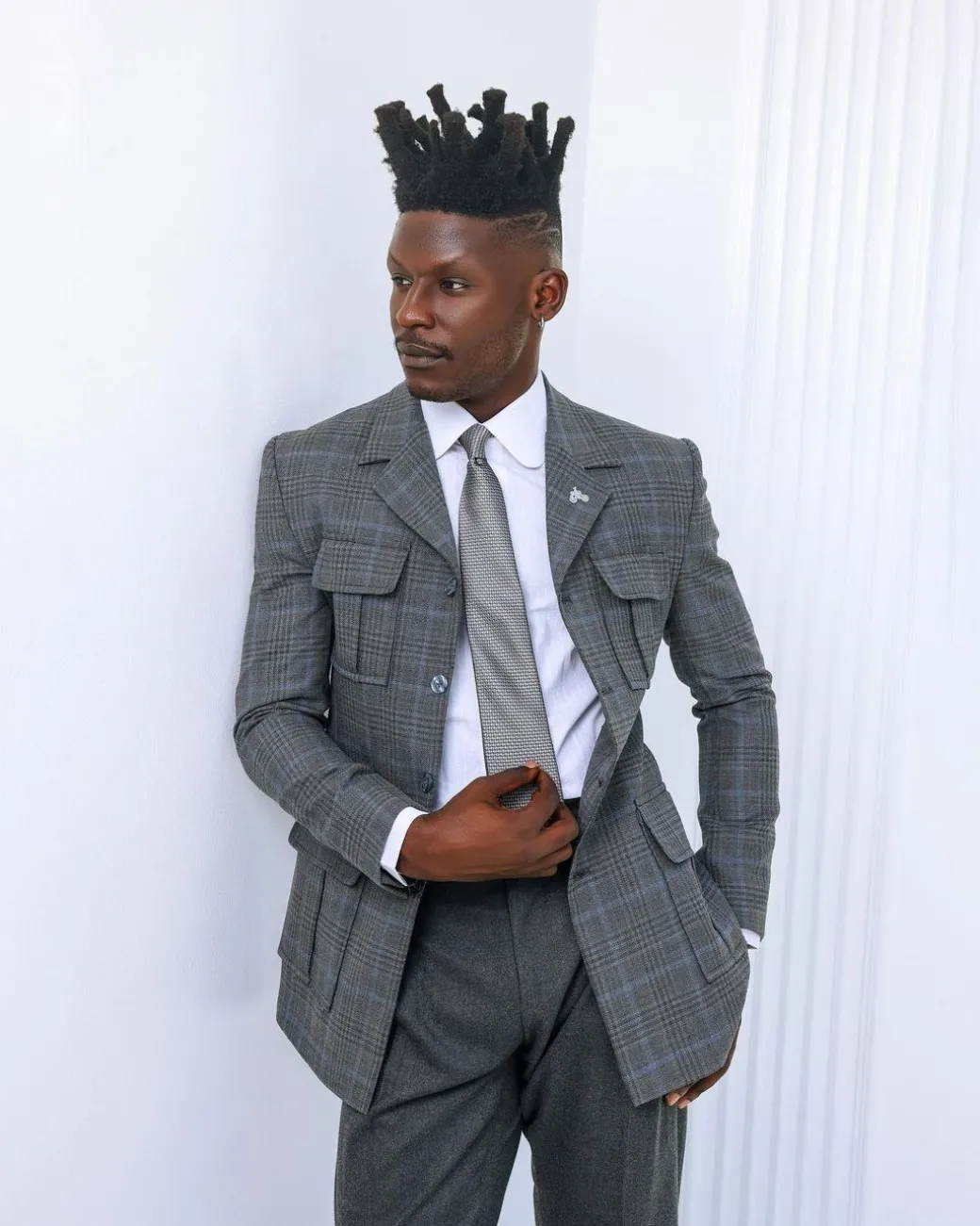 A Grey and light blue tattersall check overcoat