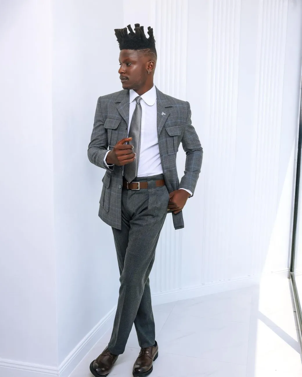 A Grey and light blue tattersall check overcoat