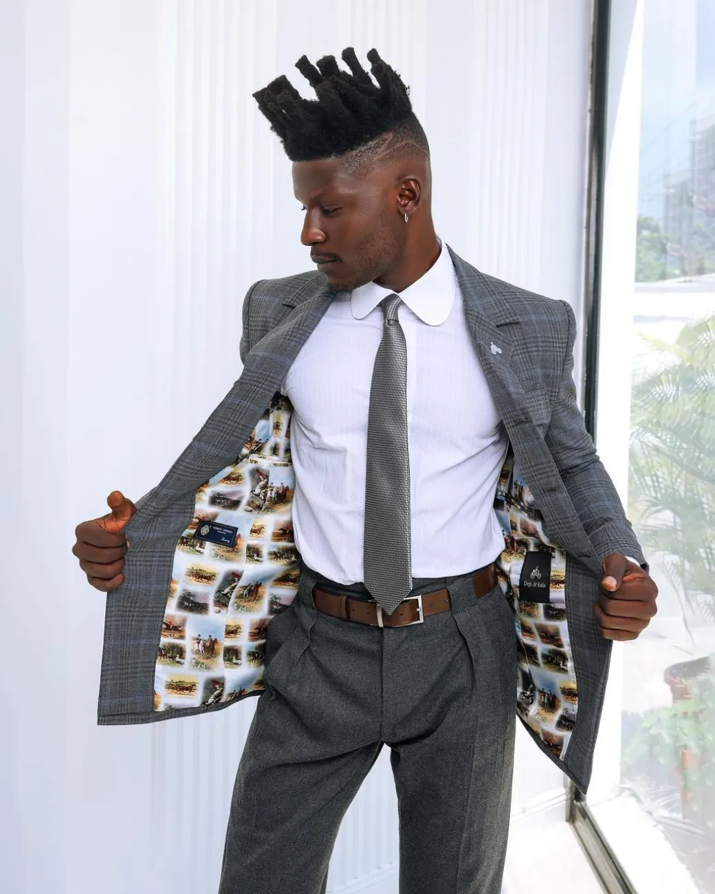 A Grey and light blue tattersall check overcoat