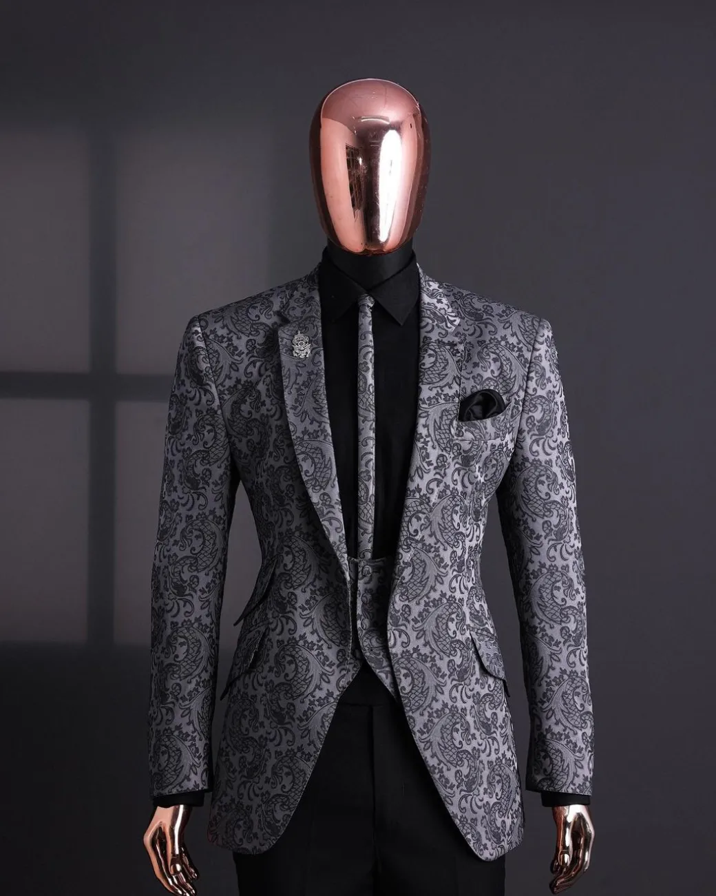 A Grey dragon floral, knitted, notch lapel suit.