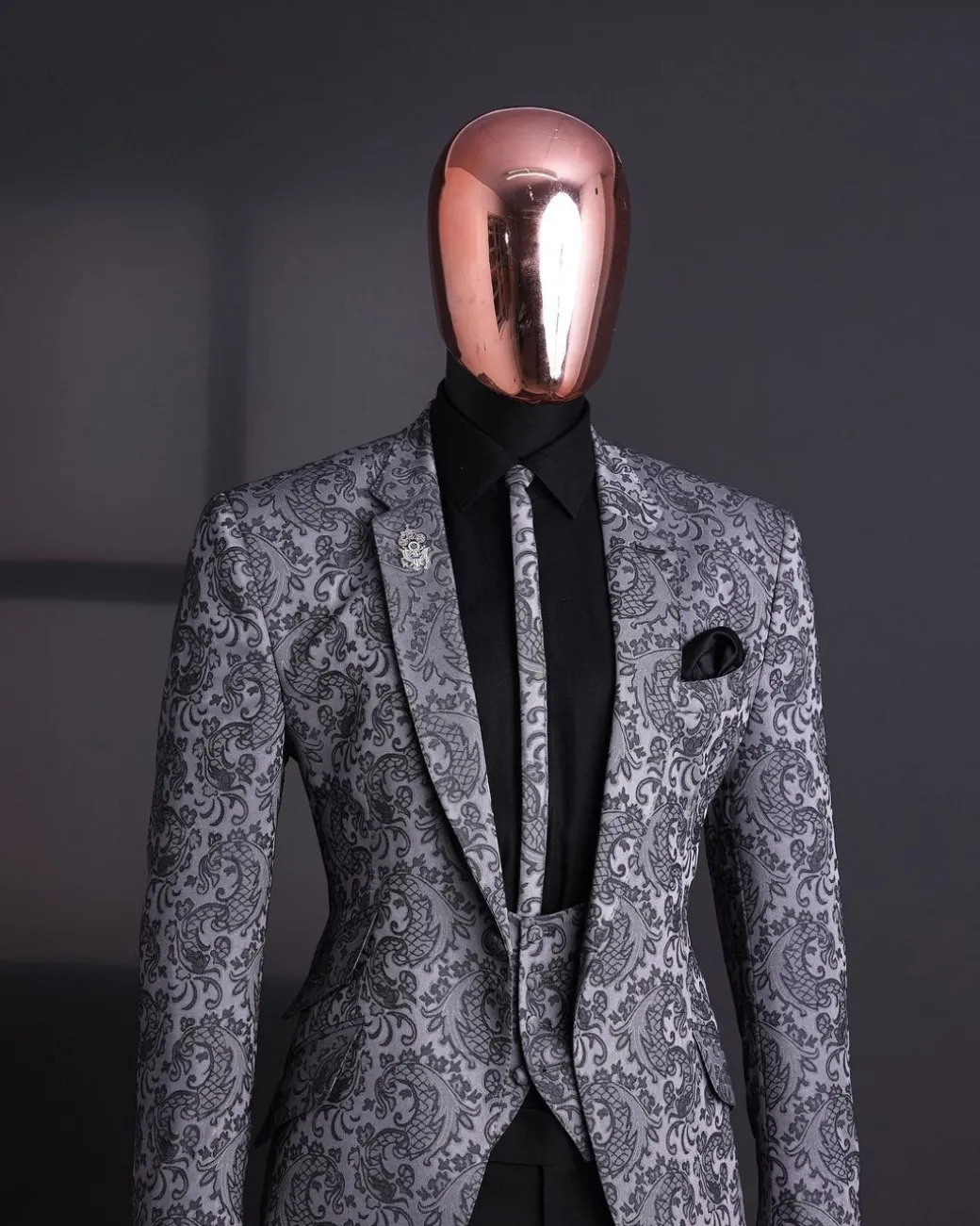 A Grey dragon floral, knitted, notch lapel suit.