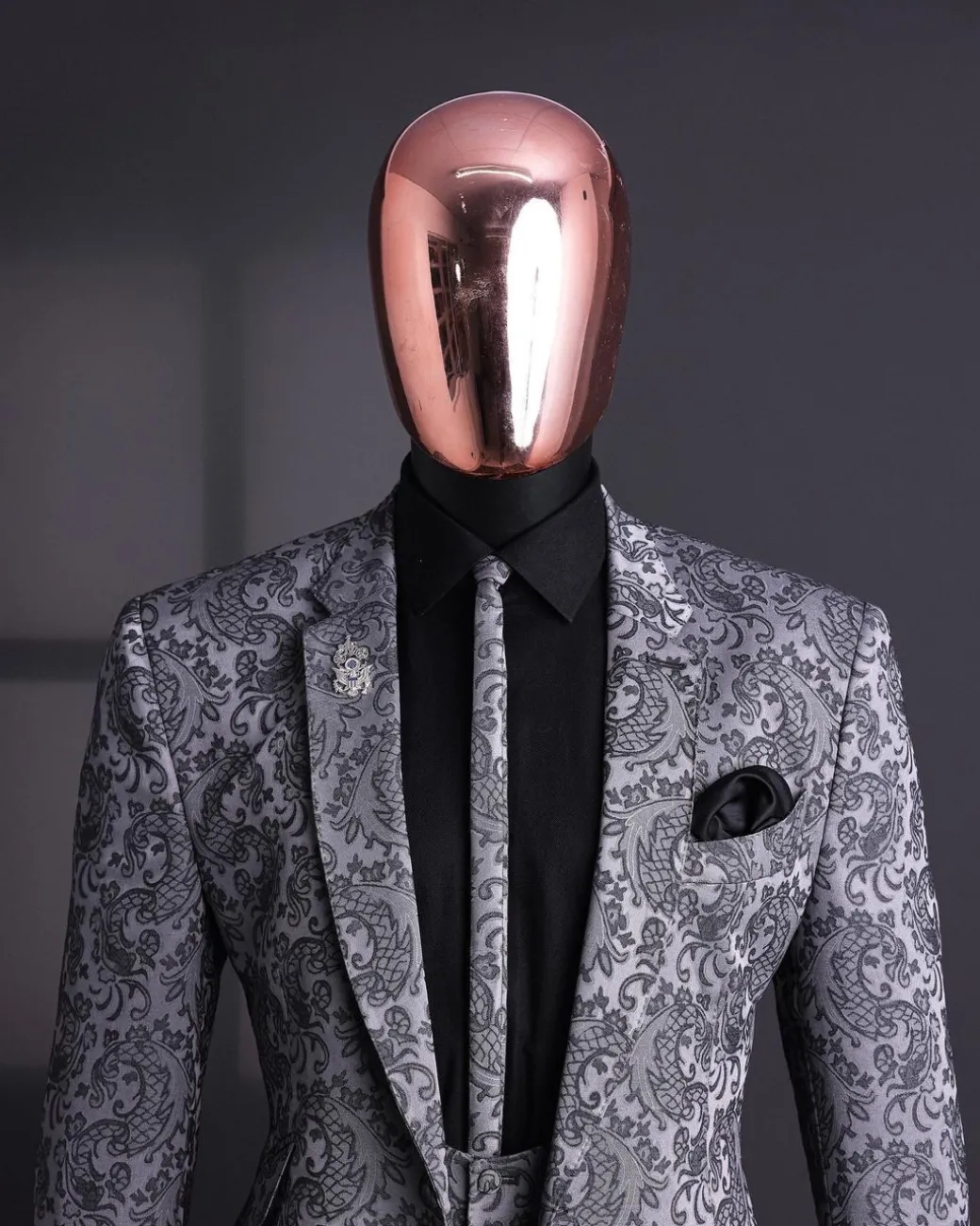 A Grey dragon floral, knitted, notch lapel suit.