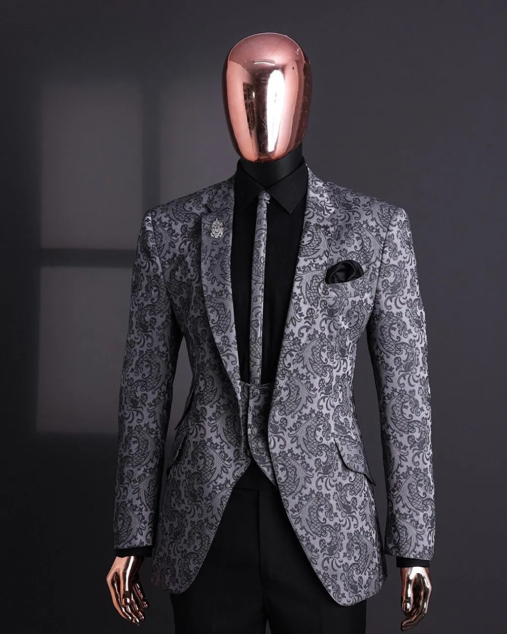 A Grey dragon floral, knitted, notch lapel suit.