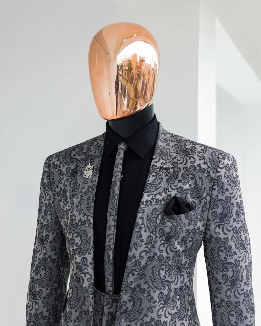 A Grey dragon floral, knitted, notch lapel suit.