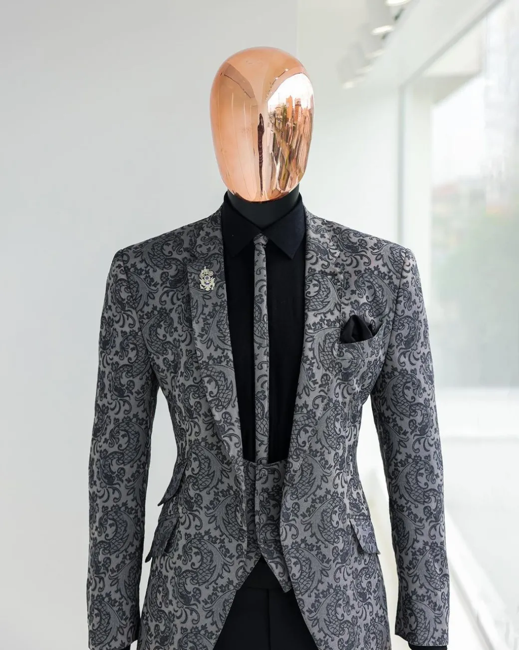 A Grey dragon floral, knitted, notch lapel suit.