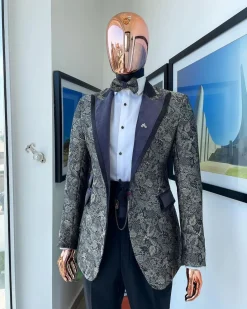 A grey floral jacquard peak lapel with black silk taping tuxedo suit