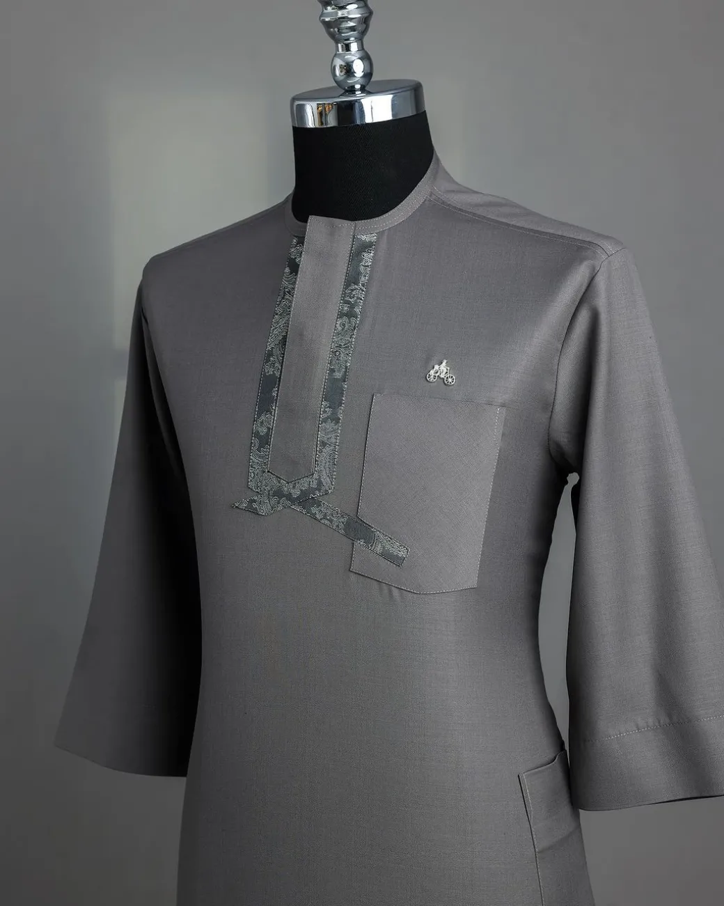 A Grey, matching slanted paisley, front flap, 3/4-sleeve African senator kaftan native.