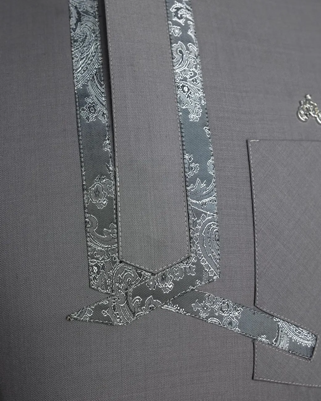 A Grey, matching slanted paisley, front flap, 3/4-sleeve African senator kaftan native.