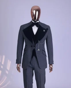 A grey octagonal patterned, navy blue mix, wide notch lapel, single button suit