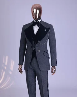 A grey octagonal patterned, navy blue mix, wide notch lapel, single button suit