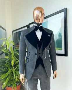 A grey octagonal patterned, navy blue mix, wide notch lapel, single button suit