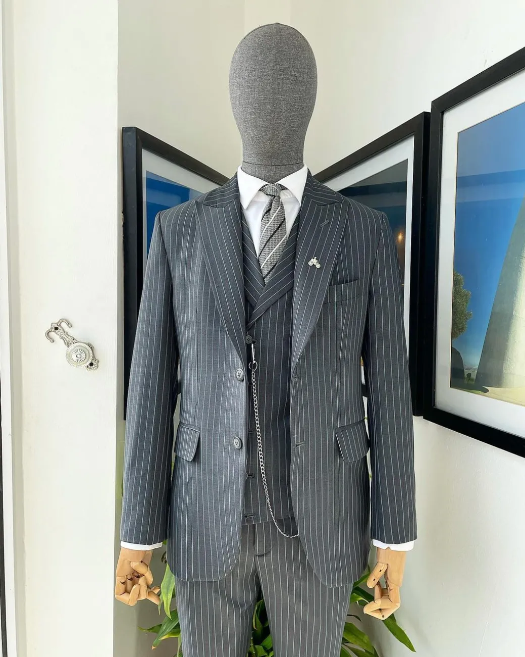 A Grey pencil stripe peak lapel suit, double-breasted notch lapel suit