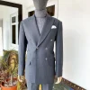 A Grey Pinstripe Peak Lapel Double Breasted Suit