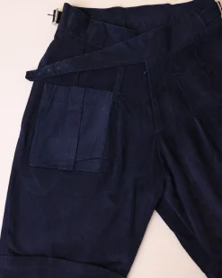A “Gurkha”pant shorts with pleats, double side strap buckle, combat patch pocket.