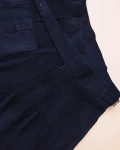 A “Gurkha”pant shorts with pleats, double side strap buckle, combat patch pocket.
