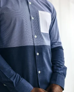A Half-cut, white details layered casual shirt.