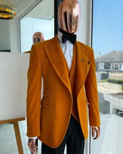 A Hand knitted soaked Italian velvet ochre yellow peak lapel suit