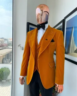 A Hand knitted soaked Italian velvet ochre yellow peak lapel suit