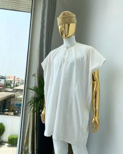 A Hand picked (jakan design) ivory white dashiki buba, sokoto & a cream patterned wool hat.