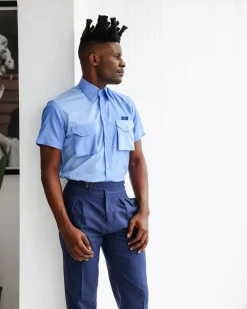 A Herringbone mix shade of blue English spread collar short sleeve casual shirt with double patch pocket.