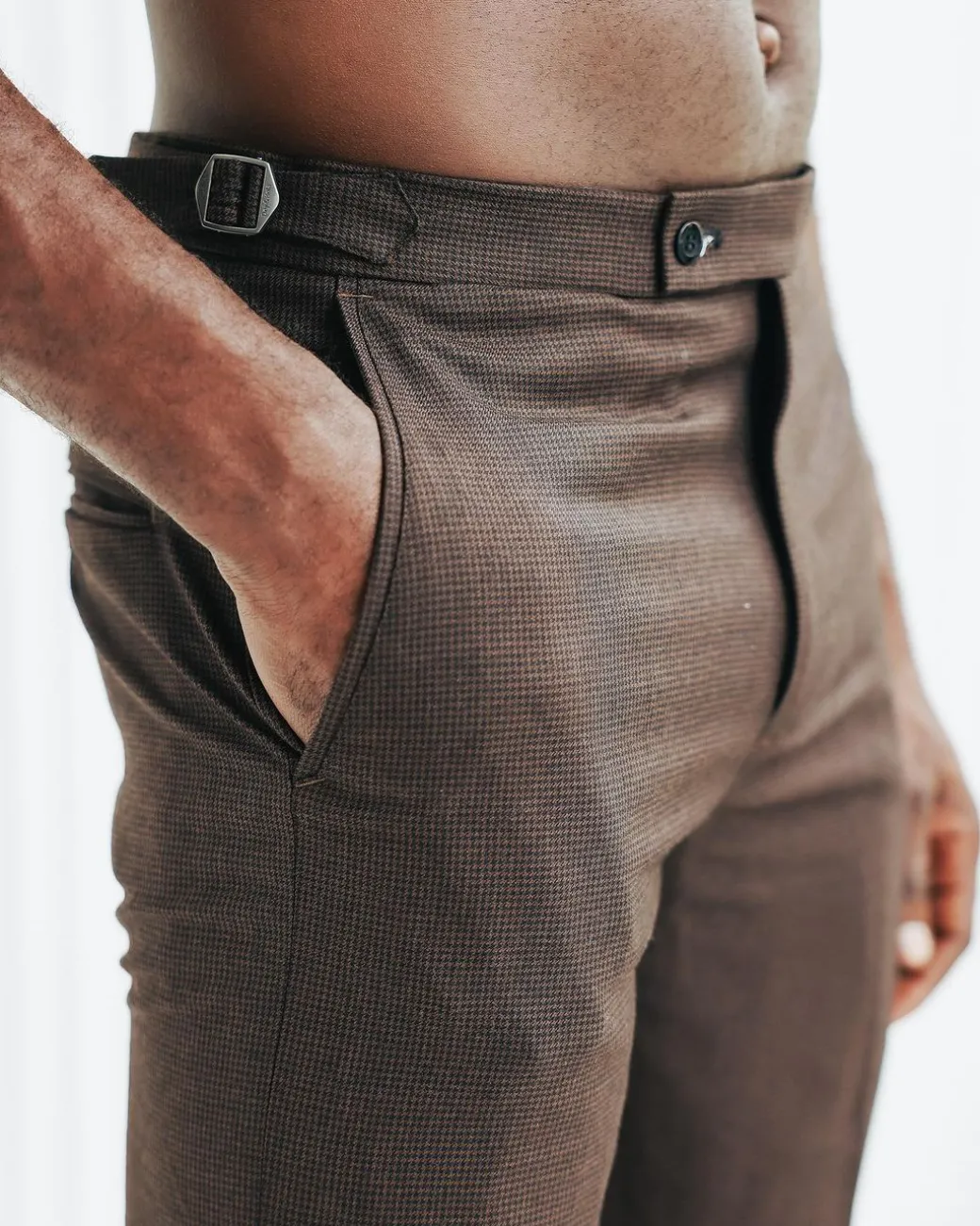 A Hickory brown & black check, nobility, tapered cut pant with side metal adjuster.