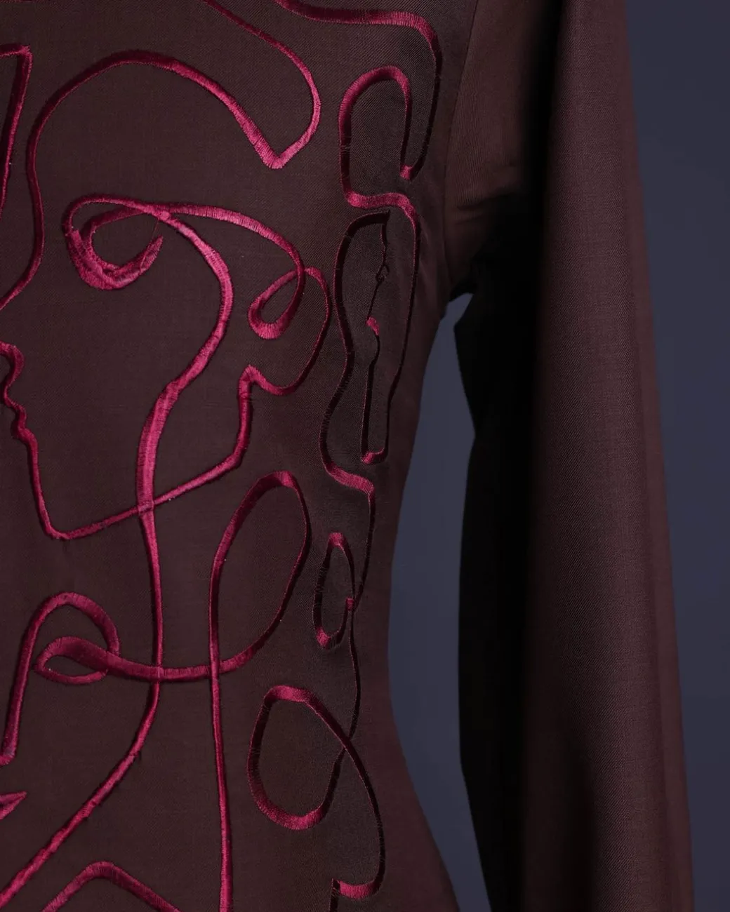 A Hickory Brown, front flap with “Eve Of May” embroidery detailing African senator kaftan native.