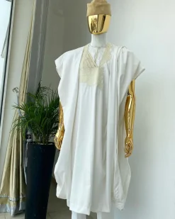 A “jakan” hand woven embroidery agbada, dashiki, sokoto with a cream wool patterned hat.