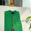A Kelly green, wavy (plum) light front flap and pocket embroidery detailing African traditional senator kaftan native.