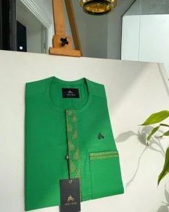 A Kelly green, wavy (plum) light front flap and pocket embroidery detailing African traditional senator kaftan native.