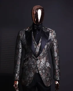 A knitted, brown, silver and black floral jacquard peak lapel suit