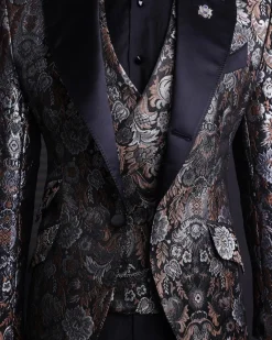 A knitted, brown, silver and black floral jacquard peak lapel suit