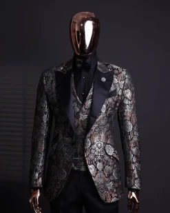 A knitted, brown, silver and black floral jacquard peak lapel suit