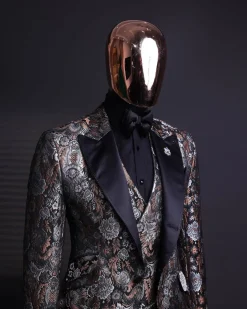 A knitted, brown, silver and black floral jacquard peak lapel suit