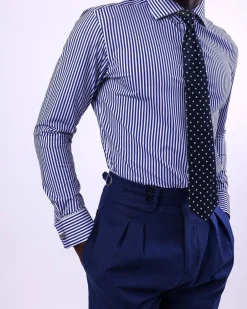 A knitted elastic, white and blue stripe shirt.