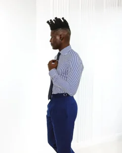 A knitted elastic, white and blue stripe shirt.