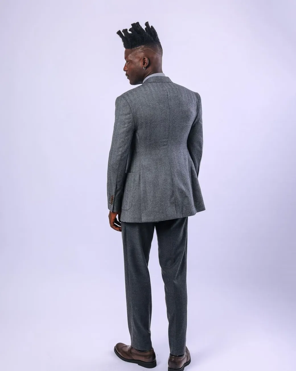 A knitted, Grey, notch lapel, patch pocket business suit