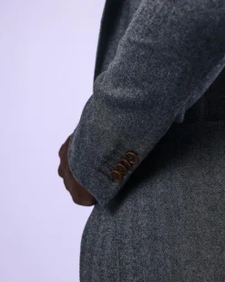 A knitted, Grey, notch lapel, patch pocket business suit