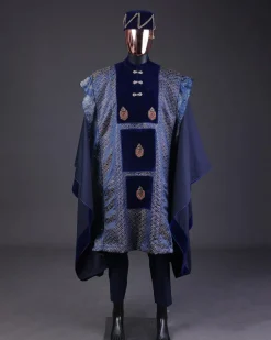 A “krosscut” layered, minted Gold, Skye, navy and admiral blue mix metallic jacquard front cut agbada.