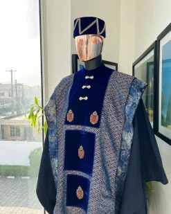 A “krosscut” layered, minted Gold, Skye, navy and admiral blue mix metallic jacquard front cut agbada.