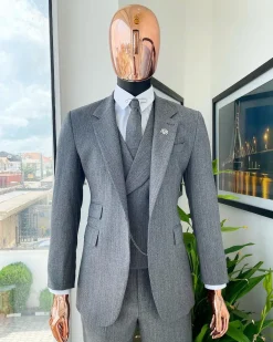 A Lava Grey, herringbone-patterned fabric Jorgecarli Super 140’s “Board Room” notch lapel suit